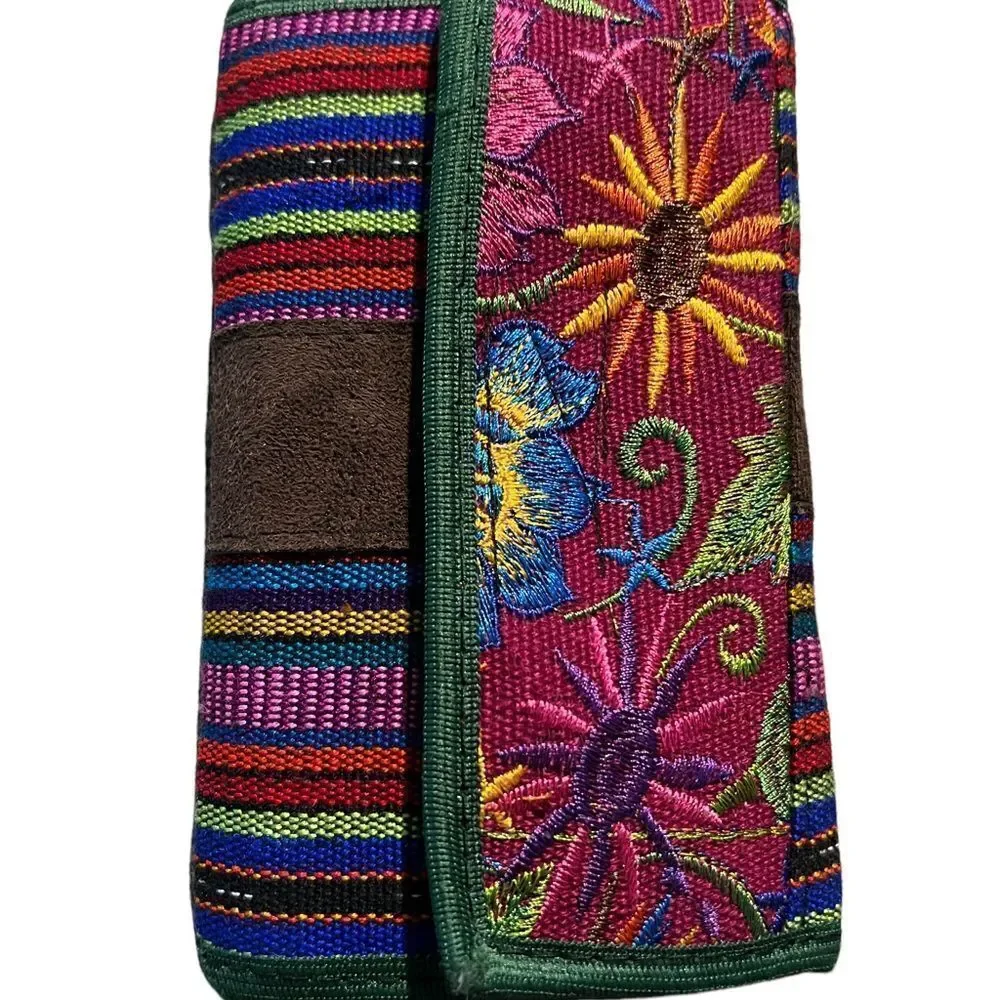 ‎Gorgeous boho wristlet in vibrant primary colors